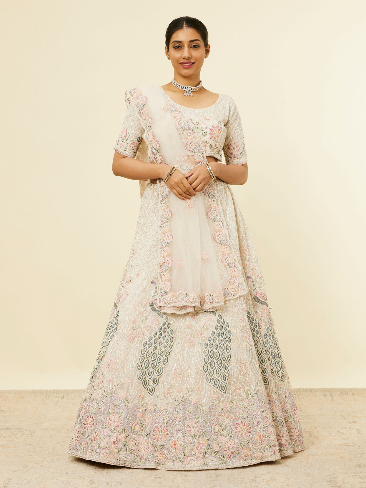 alt message - Mohey Women Beige Cream Sitara Embroidered Lehenga with Stone Work image number 0